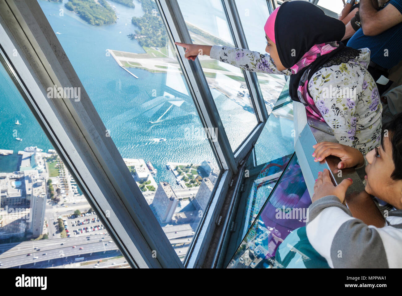 Toronto Canada,Bremner Boulevard,CN Tower,observation towermodern wonder,Sky Pod,window view south,Lake Ontario,Toronto Island,Islands,Asian Asians et Stock Photo