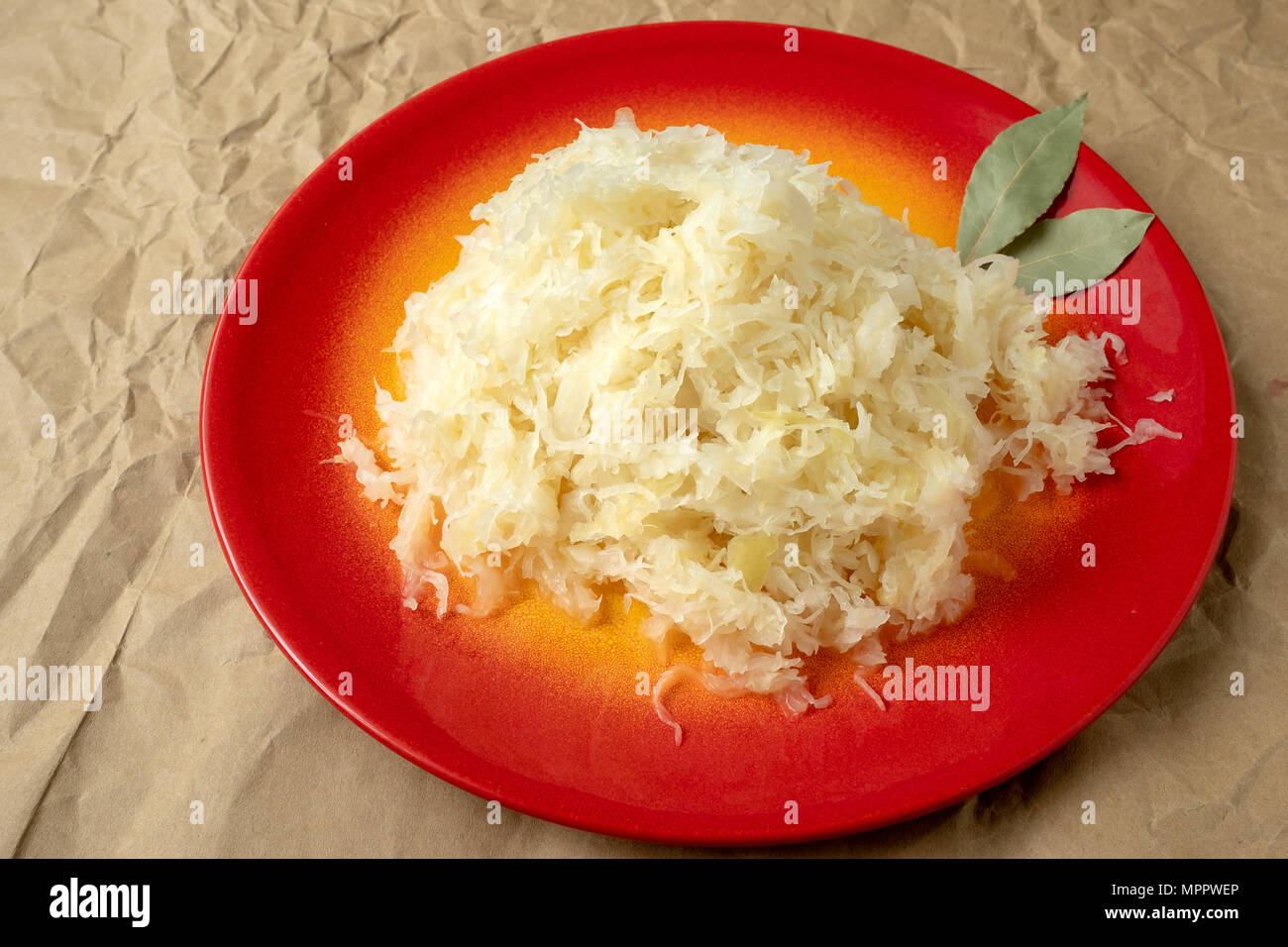 Fermented cabbage. Red plate of sauerkraut (pickled white cabbage Stock Photo Alamy