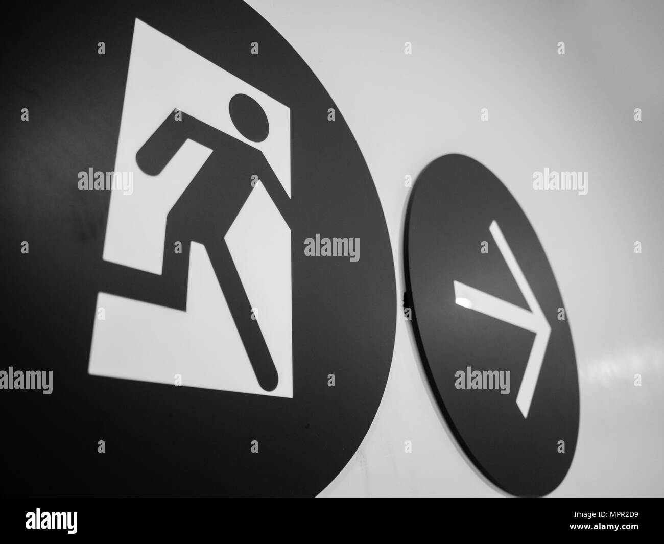 Black and white of close up Emergency exit sign Stock Photo
