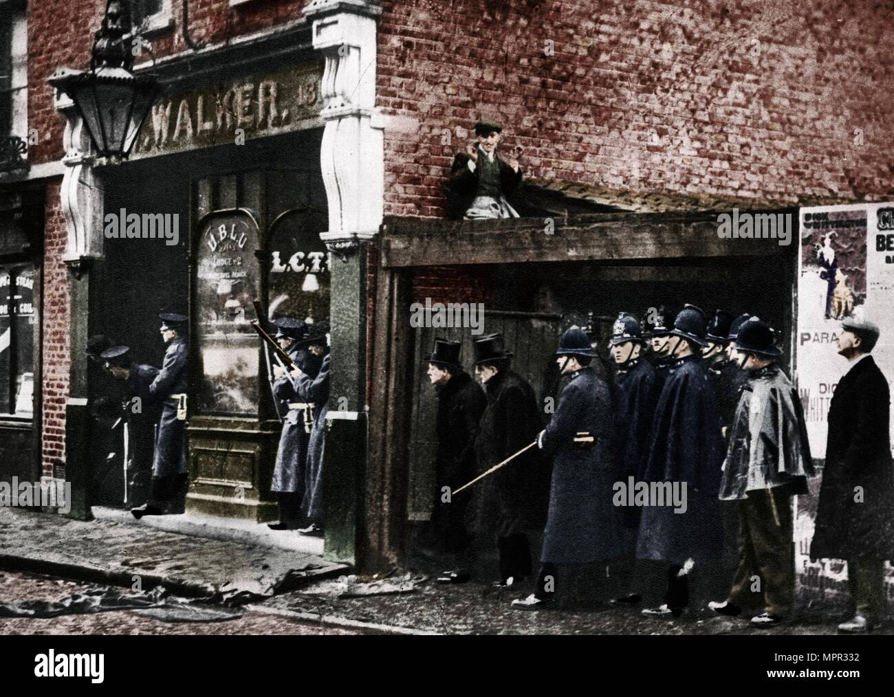 The Sidney Street siege, Whitechapel, London, 1911, (1935).  Artist: Unknown. Stock Photo