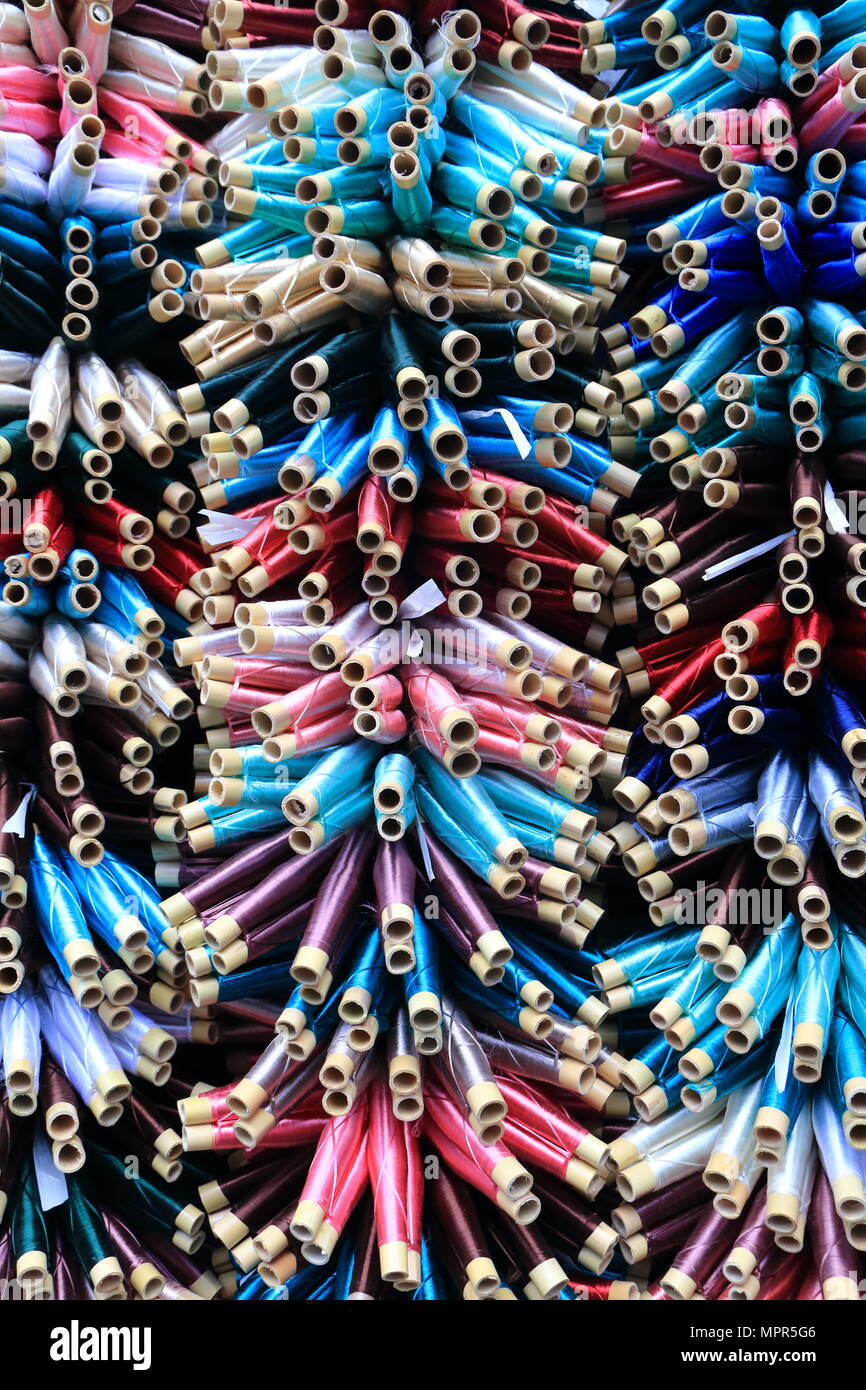 Collection of silk threads with many of colors Stock Photo - Alamy