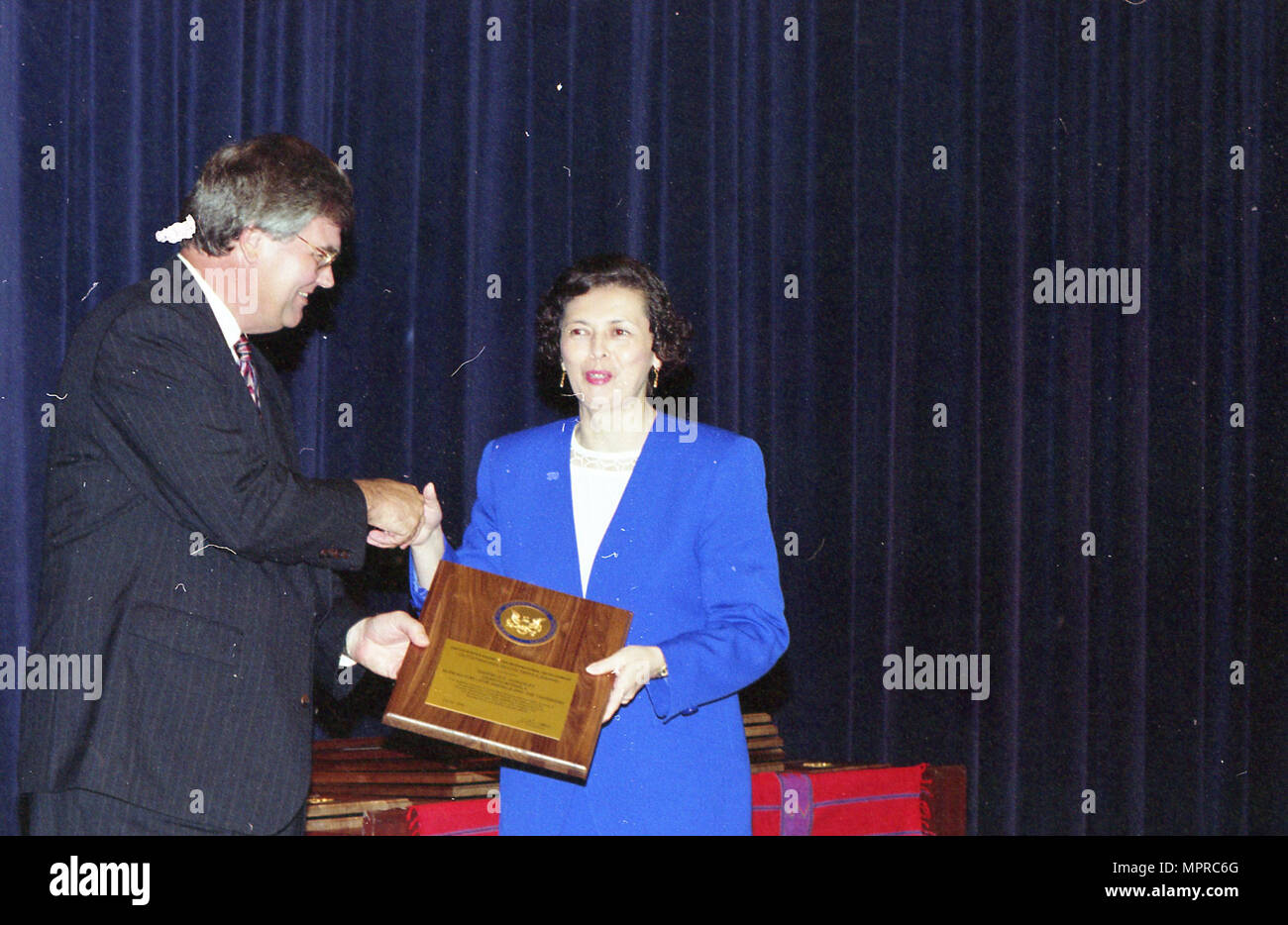 Admin. Atwood contact sheet CFC; Health Fair Woman receiving award