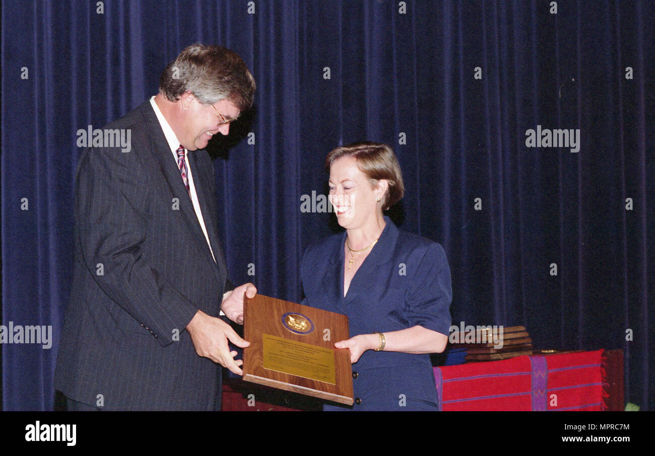 Admin. Atwood contact sheet CFC; Health Fair Woman receiving award