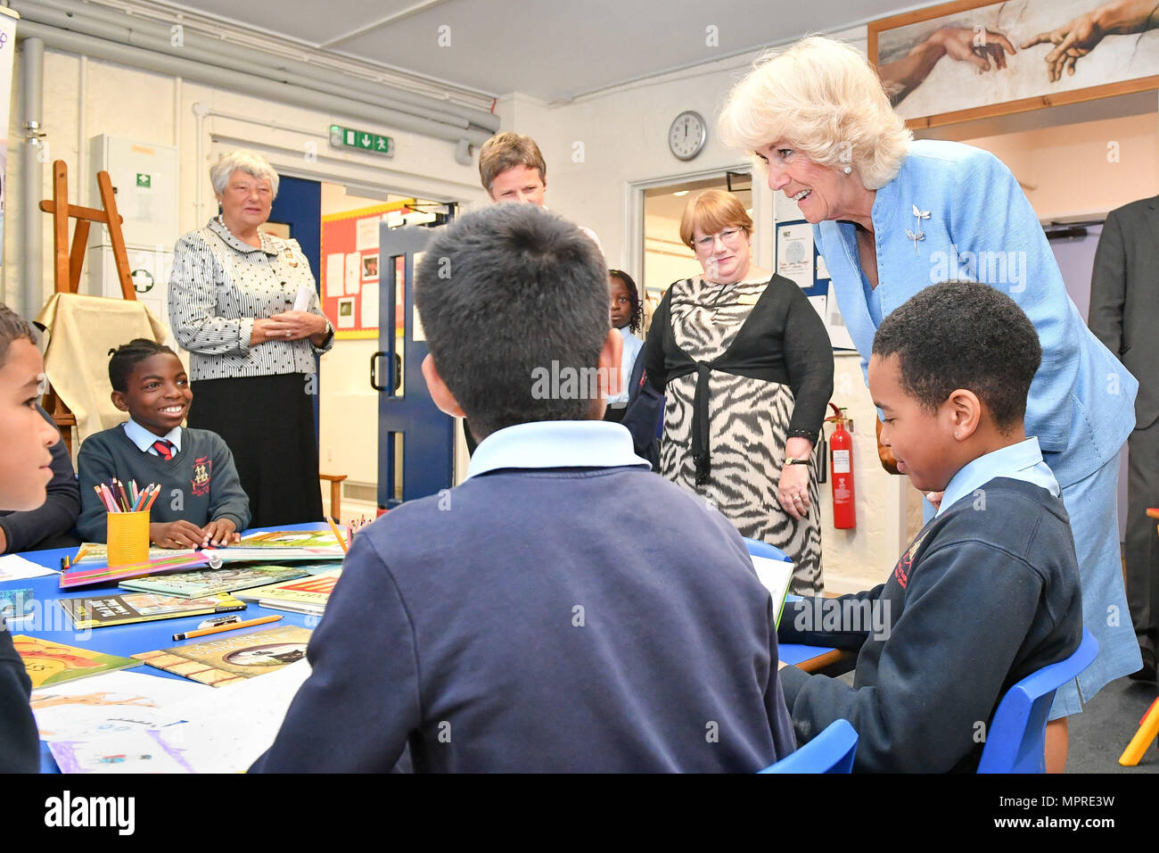 the-duchess-of-cornwall-joins-in-a-beanstalk-reading-session-with-pupils-of-st-james-church-of-england-junior-school-gloucester-MPRE3W.jpg