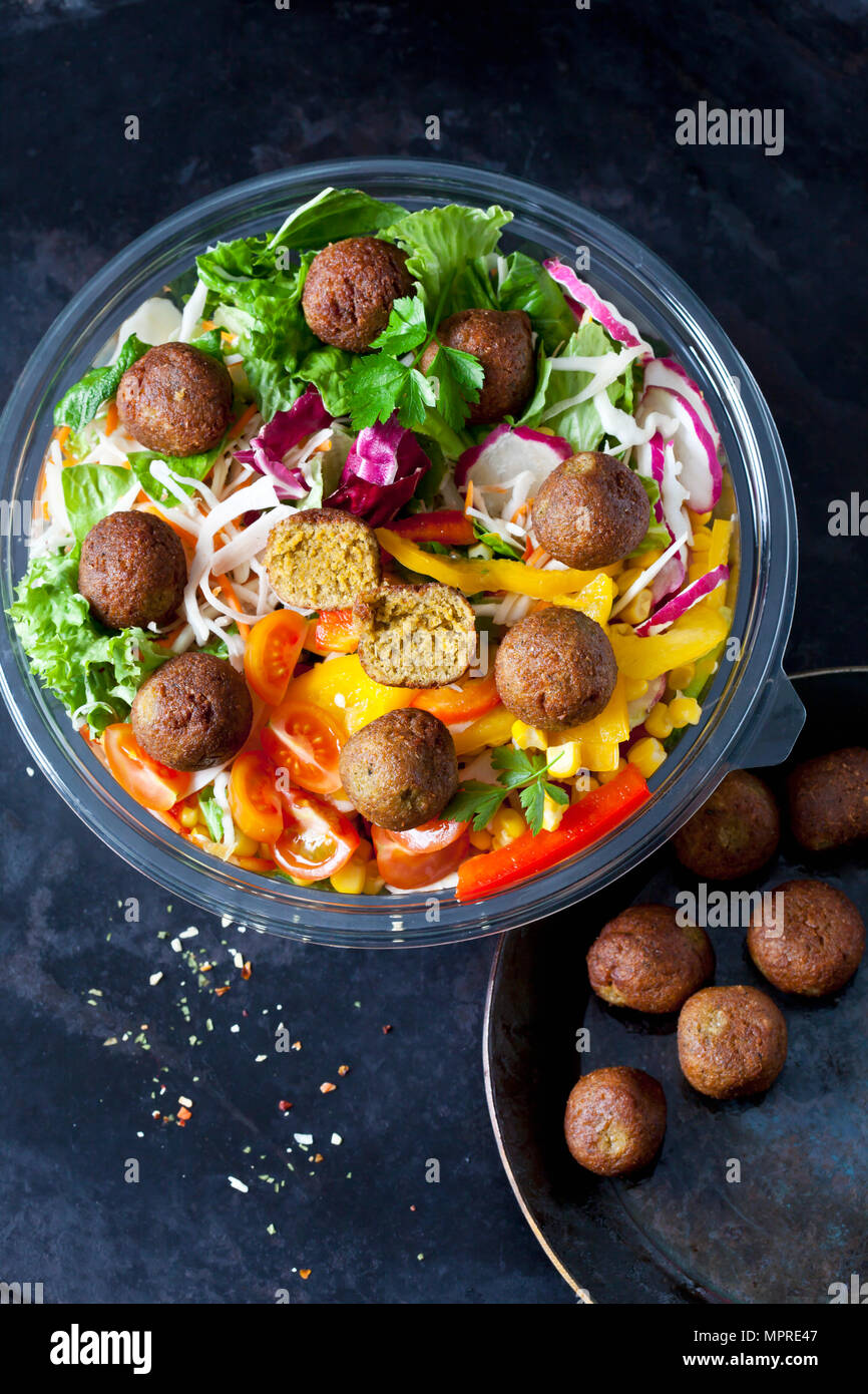 Bowl of mixed salad with vegetable balls Stock Photo