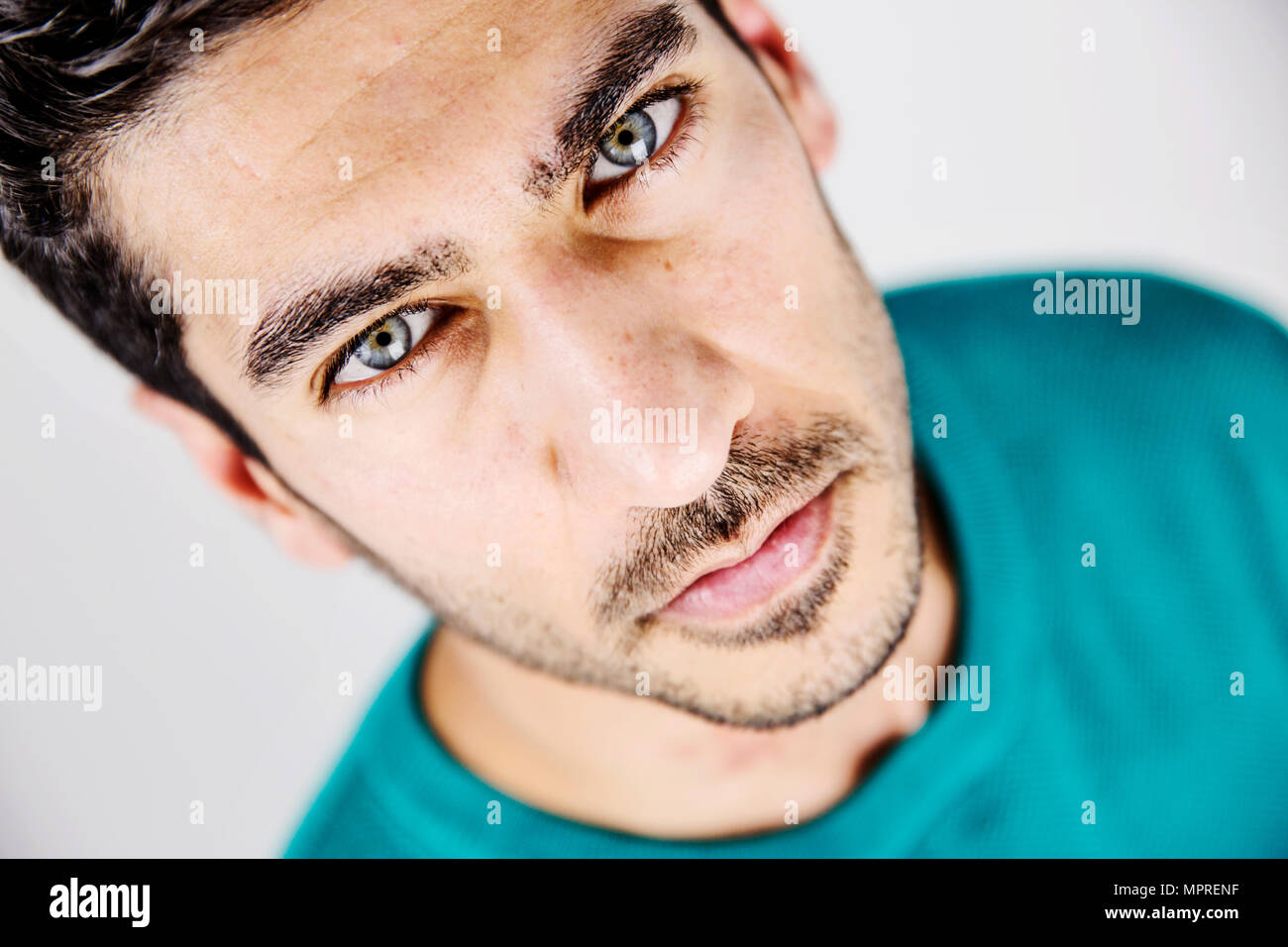 Blue-eyed man with dark hair and tattoo - wide 8