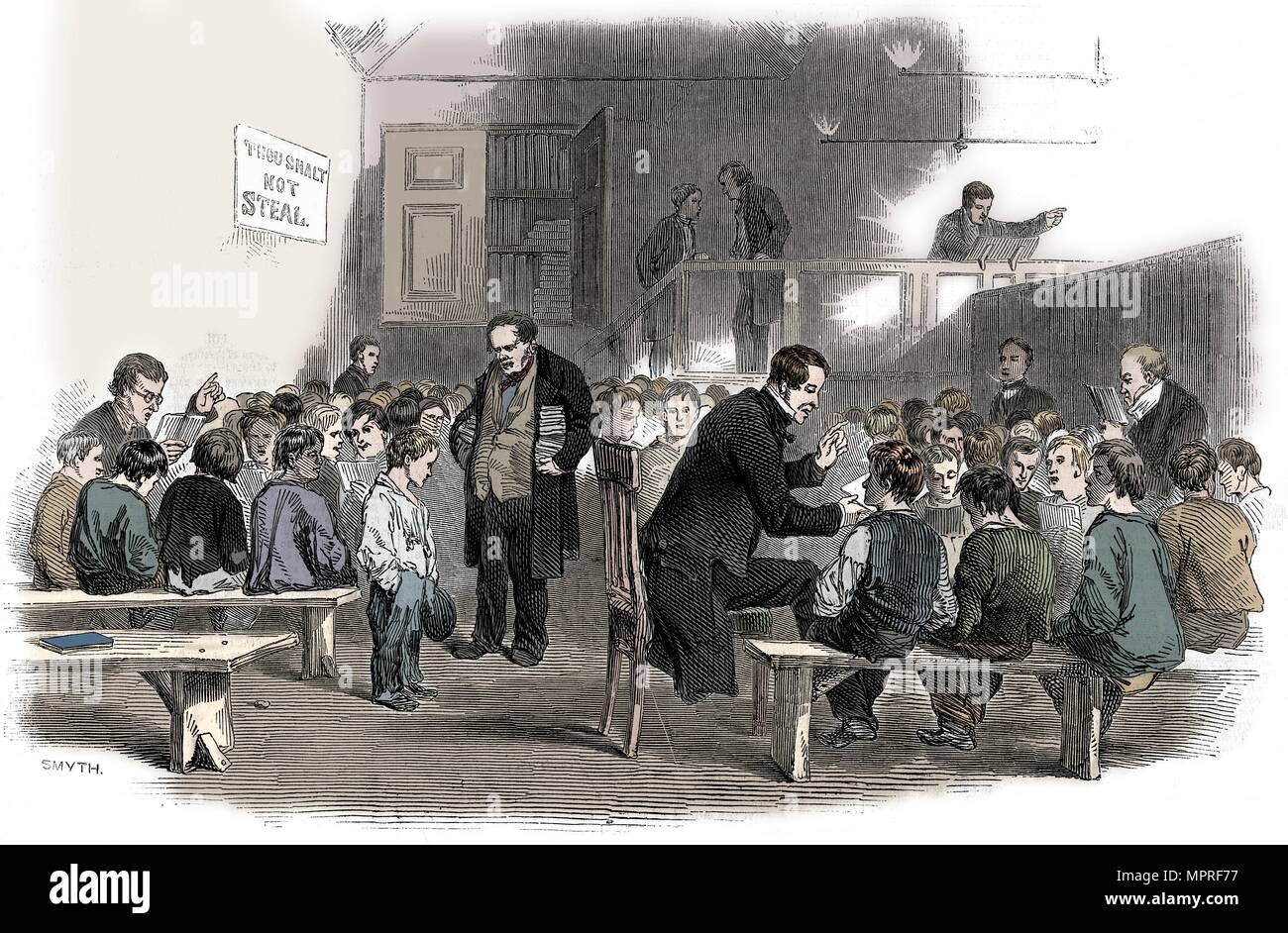 Teaching boys to read in the Ragged School Union school, Lambeth, London, 1868. Artist: Unknown. Stock Photo