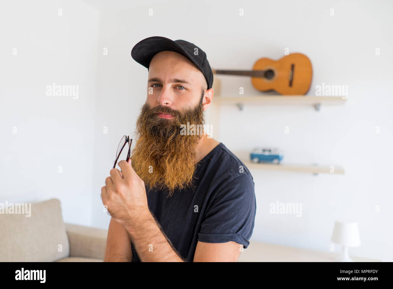 Young man with baseball cap hi-res stock photography and images - Alamy