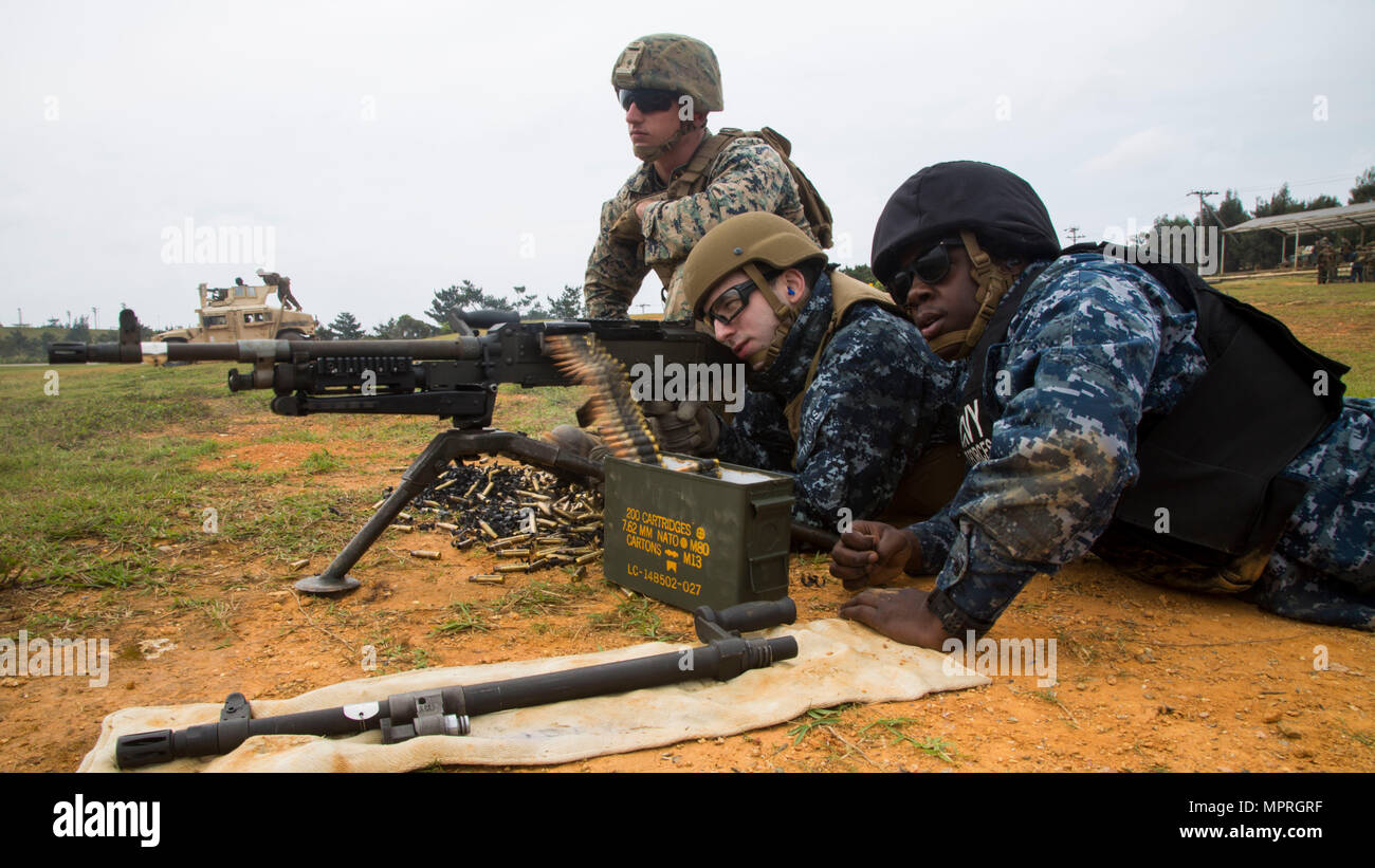 U.S. Marine Corps Cpl. Triston Morrison-Price, left, a machine gunner ...