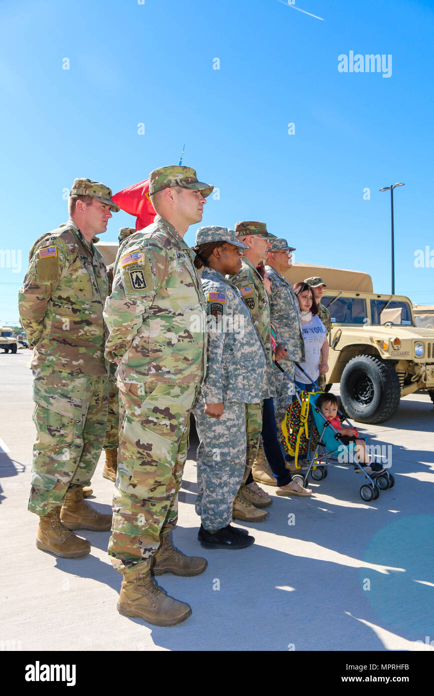 Leaders come together at Headquarters and Headquarters Battery, 32nd Army Air and Missile Defense Command, Fort Bliss, Texas, to assist families April 6, 2017. The goal is to stay ready by assisting families inside and outside the unit’s element. (U.S. Army photo by Sgt. Aura E. Conejos, 32d AAMDC Public Affairs) Stock Photo
