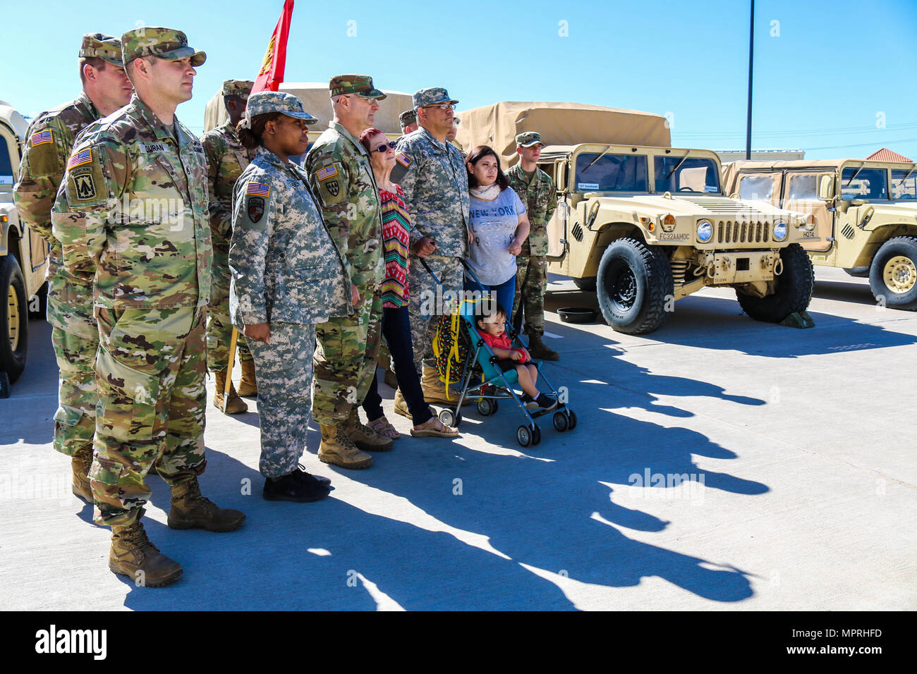 Leaders come together at Headquarters and Headquarters Battery, 32nd Army Air and Missile Defense Command, Fort Bliss, Texas, to assist families April 6, 2017. The goal is to stay ready by assisting families inside and outside the unit’s element. (U.S. Army photo by Sgt. Aura E. Conejos, 32d AAMDC Public Affairs) Stock Photo