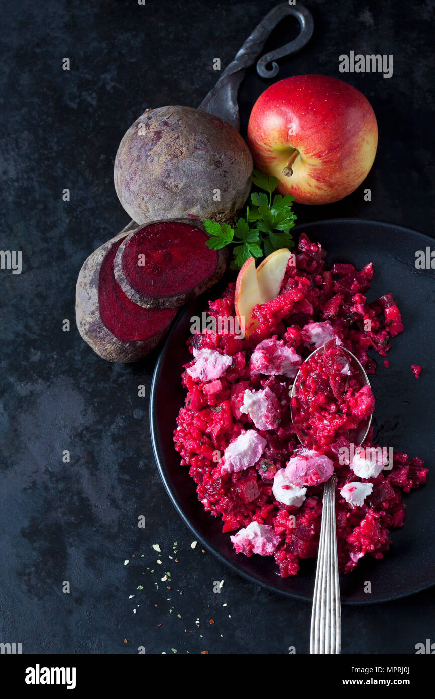 Beetroot salad with durum wheat semolina, apple and soft goat cheese Stock Photo