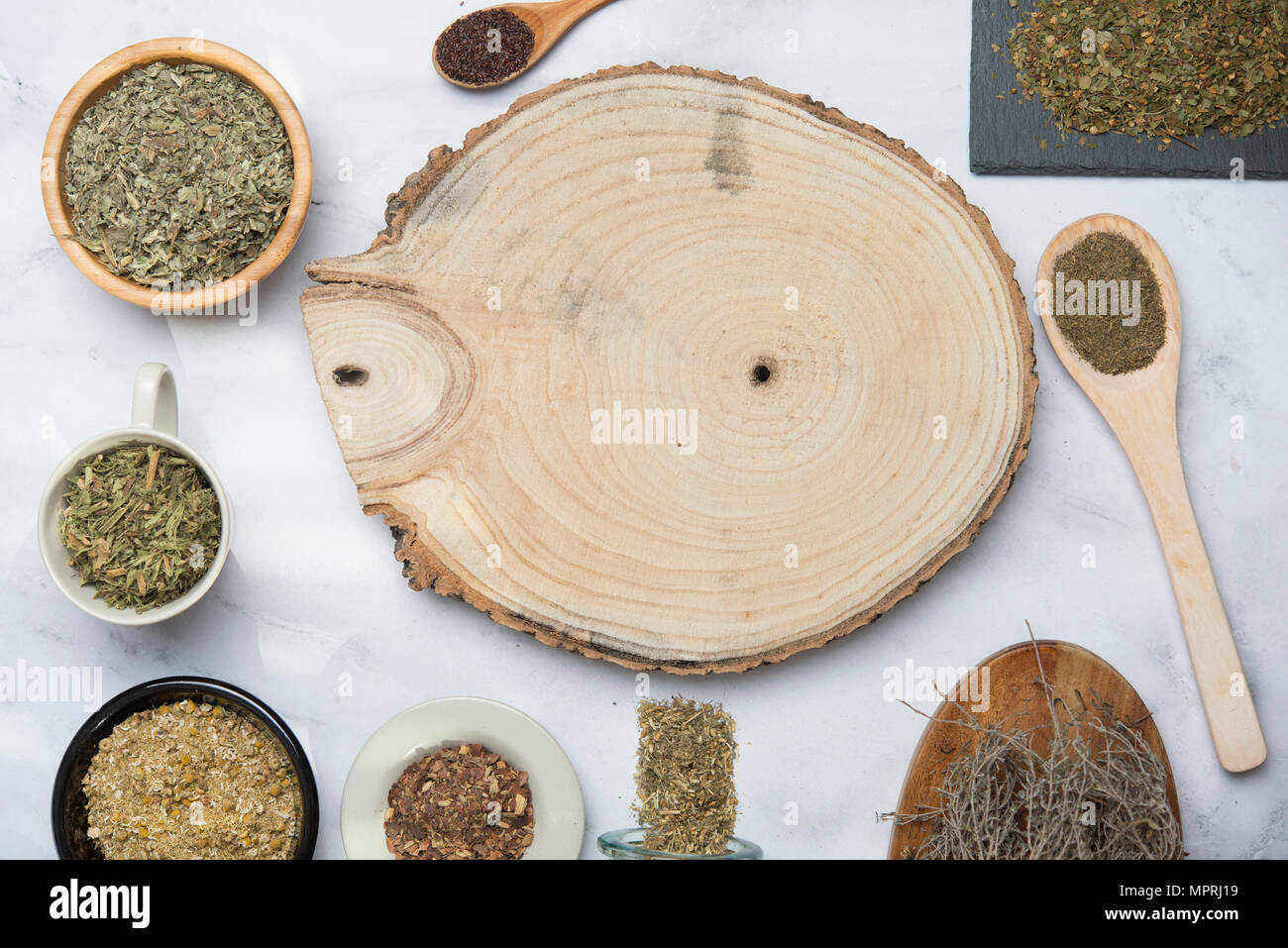 Various herbal infusions, chamimile, mint, rooibos, thyme, green tea, tisane Stock Photo Alamy