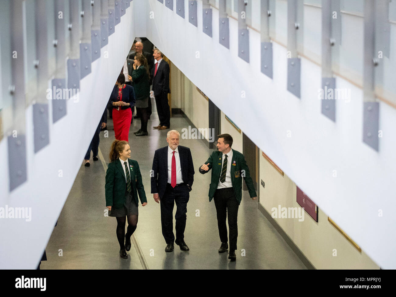 Labour leader Jeremy Corbyn (centre) with Head Girl Lucy Symington and Head Boy Michael Hare during a visit to Lagan College, Northern Ireland's first integrated school, during Mr Corbyn's first visit to Northern Ireland as party leader. Stock Photo