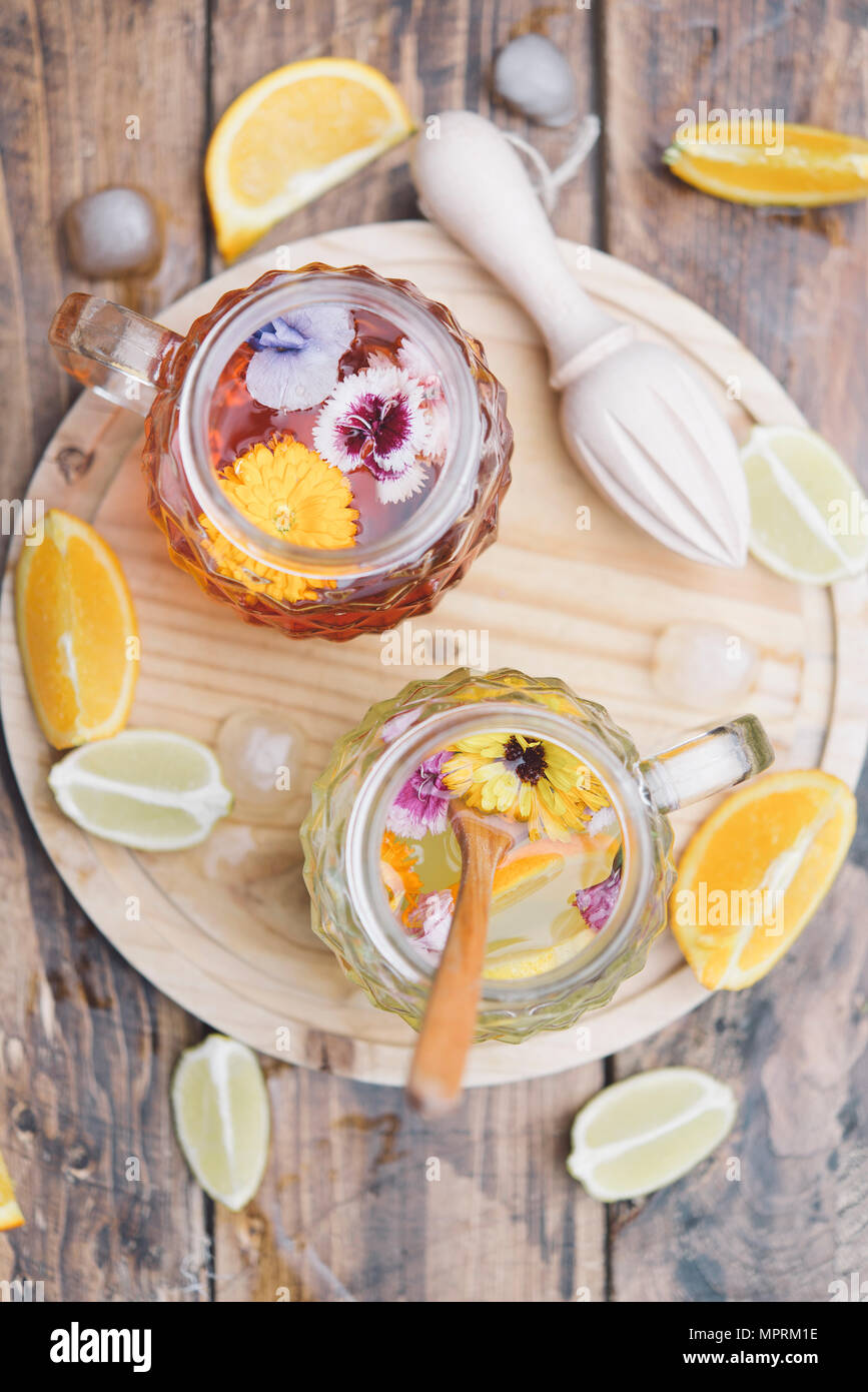 Refreshing mineral water with edible flowers, Viola wittrockiana