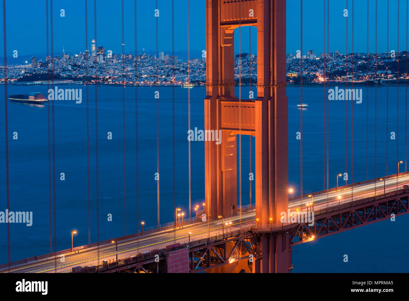 USA, California, San Francisco, Golden Gate Bridge and city at blue hour Stock Photo