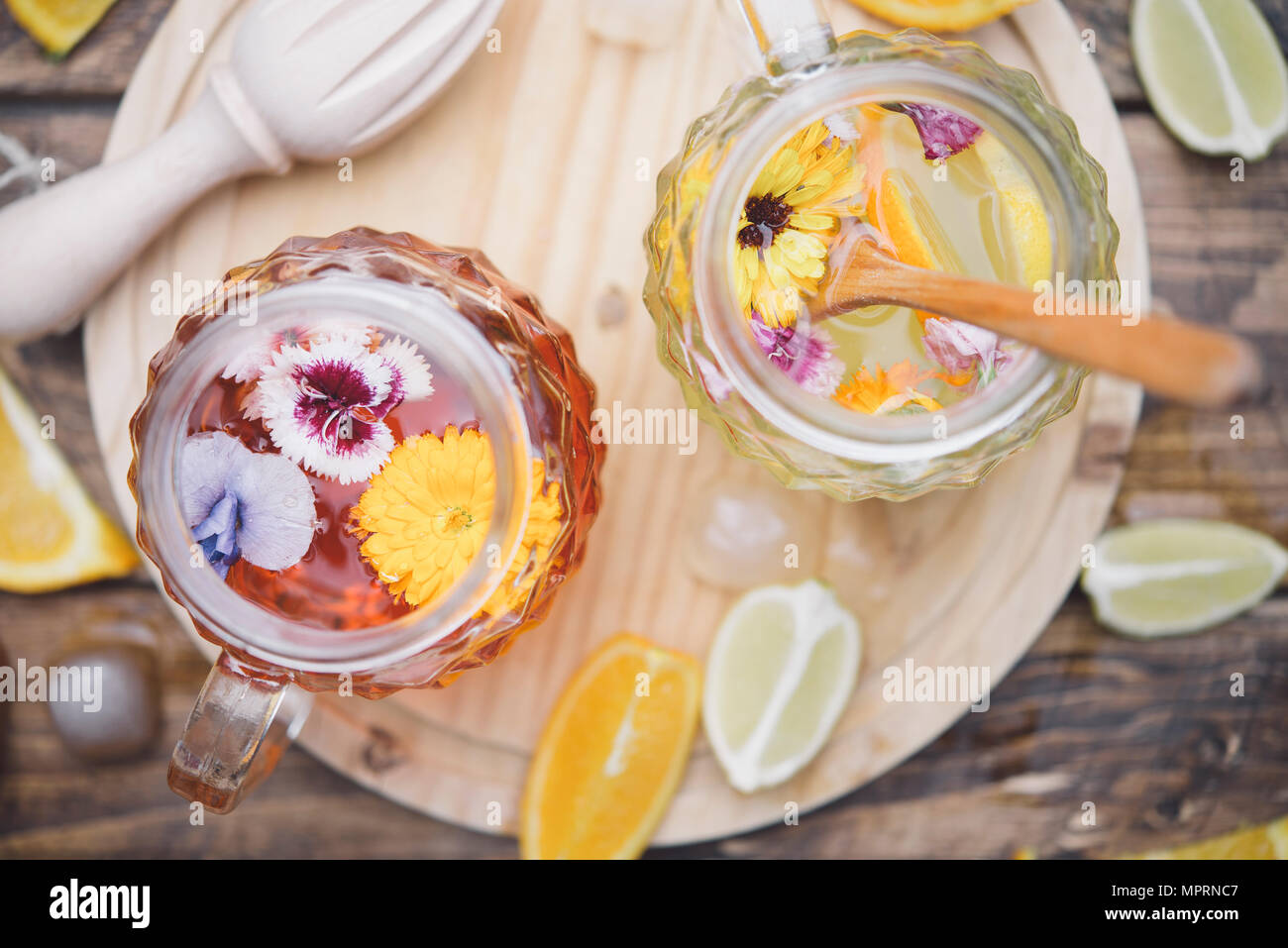 Refreshing mineral water with edible flowers, Viola wittrockiana