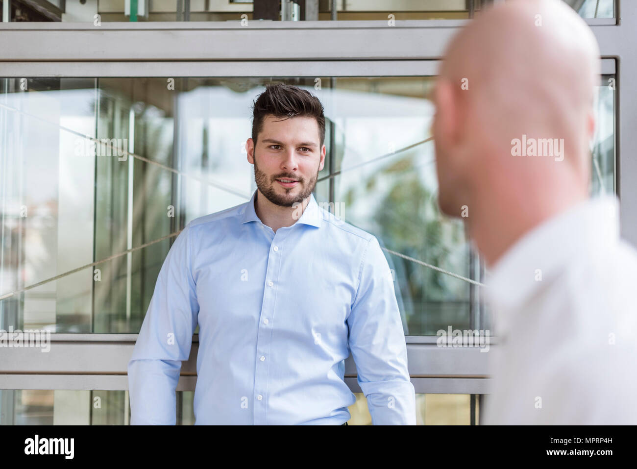 Two businessmen having a discussion Stock Photo