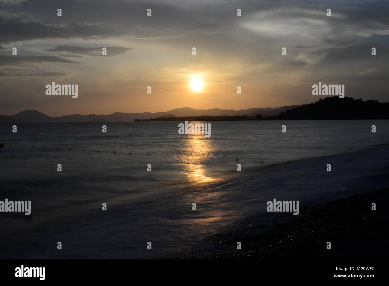 Sunset at the Beach Stock Photo - Alamy