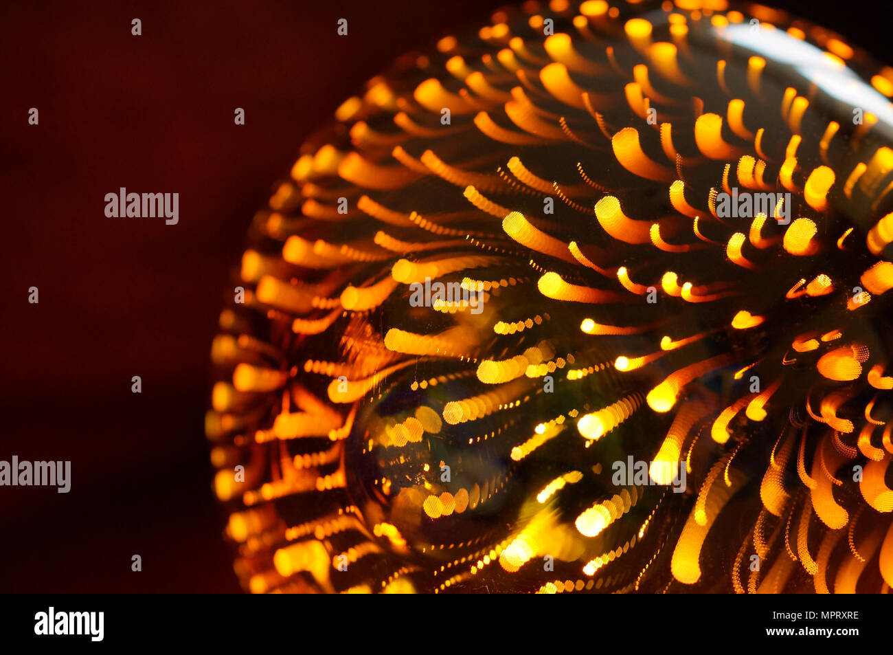 Shining light bulb with firework effect. Abstract background, closeup photo Stock Photo