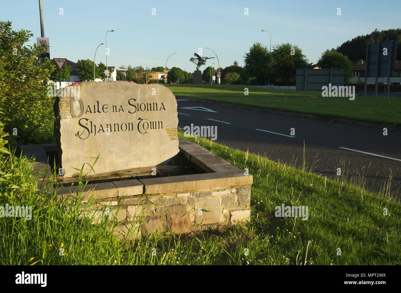 A stone sign at the entrance to Shannon town , County Clare Stock Photo