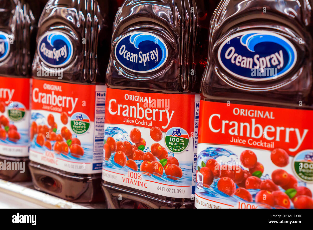 Bottles of Ocean Spray brand cooperative cranberry juice is seen in a supermarket in New York on Monday, May 21, 2018. The U.S. Dept. of Agriculture is proposing a regulation on the volume of cranberries produced by farmers for 2018-19 crops. The seasonal volume regulation would cut the glut of cranberries on the market. (Â© Richard B. Levine) Stock Photo