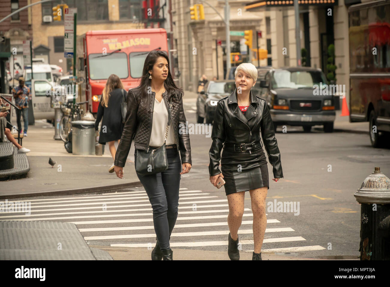 Merchants on Canal Street in New York on Thursday, May 17, 2018. Despite  the ubiquitous merchants selling schlock and counterfeit products the area  around Canal Street is reported to be undergoing a