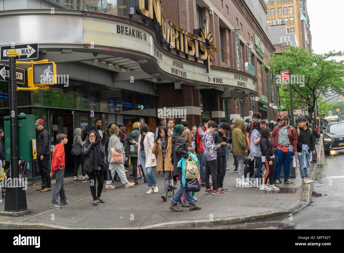 Crowds of moviegoers leave the United Artists' theater in Downtown Brooklyn in New York after their show on Sunday, May 20, 2018. The 'Deadpool  2' film  collected an estimated $125 million over its opening weekend beating out three-week champion Disney's 'Avengers: Infinity War'.(© Richard B. Levine) Stock Photo