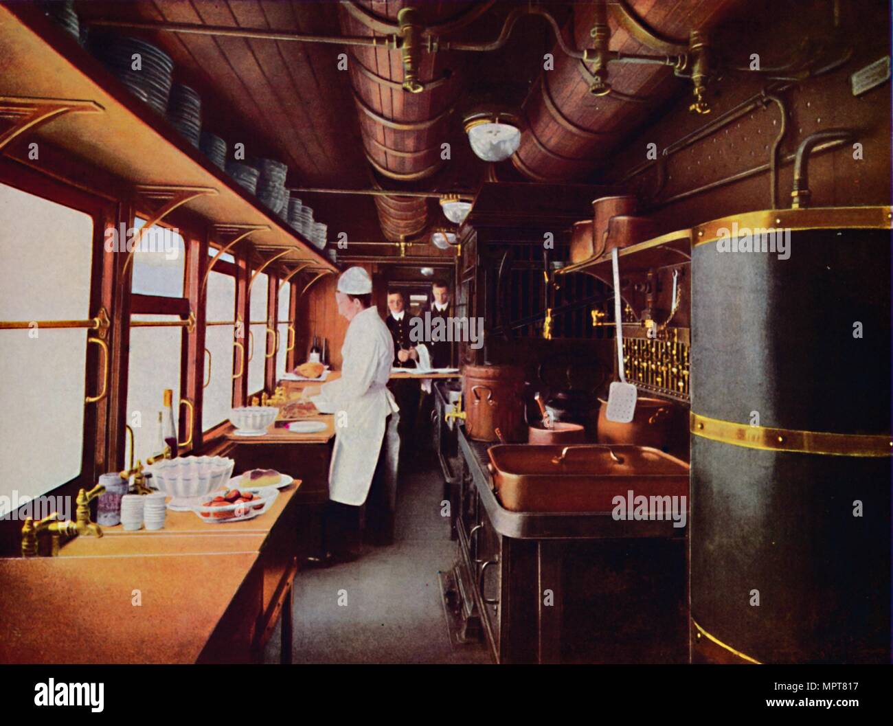 'Inside a Restaurant Car Kitchen on the L.M.S. Railway', 1926. Artist