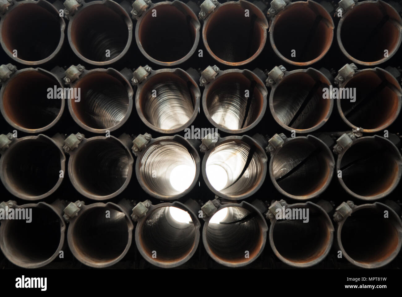 look through the tubes of BM-21 Grad 122 mm multiple rocket launcher. Stock Photo