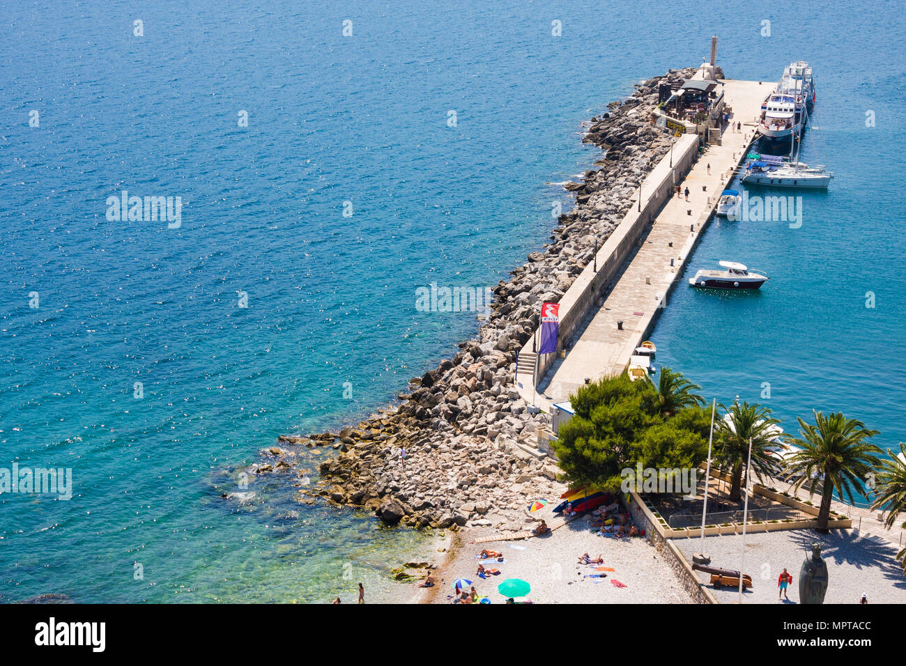 Herceg Novi, Montenegro - July 8, 2015: Herceg Novi harbor pier, anchorage and sea pool in Boka Kotorska bay Stock Photo