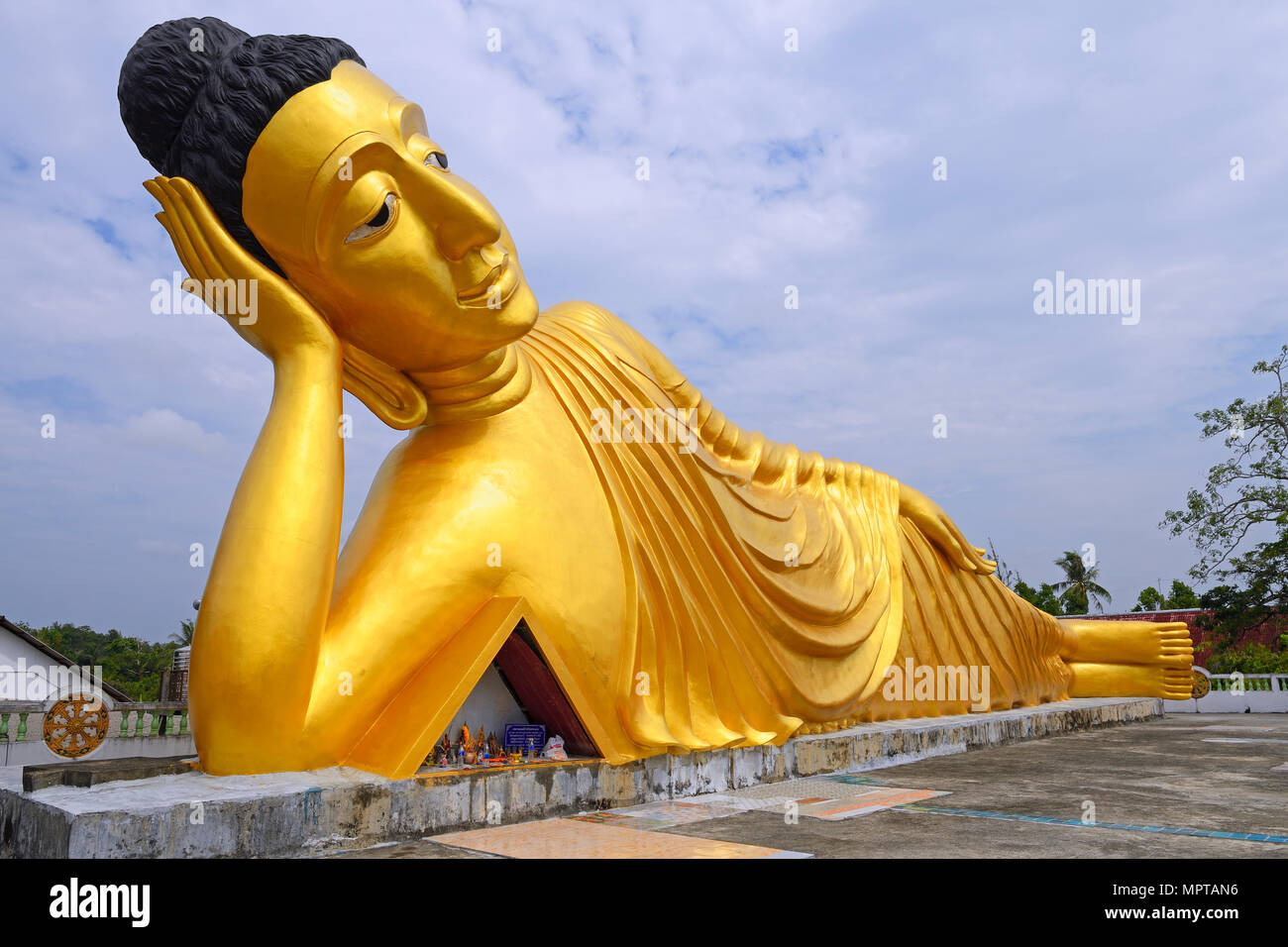 Lying golden Buddha in the temple Wat Sri Sunthon, Phuket, Thailand Stock Photo