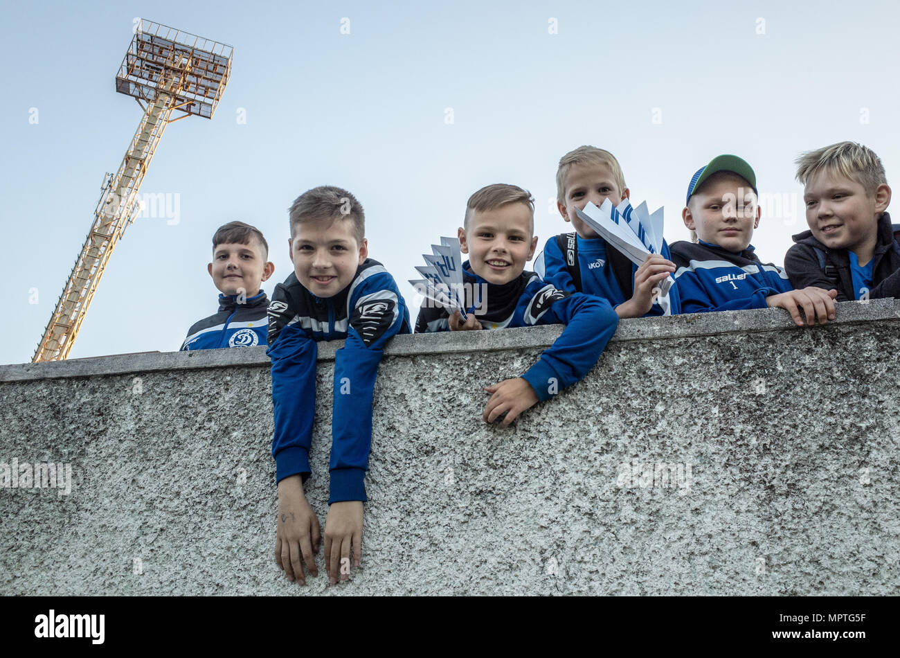 MINSK, BELARUS - MAY 23, 2018: Little fans having fun before the Belarusian Premier League football match between FC Dynamo Minsk and FC Bate at the Tractor stadium. Stock Photo