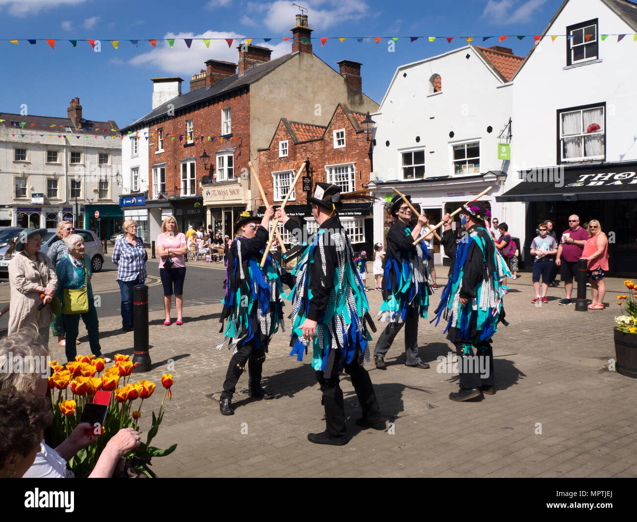 Morris dancing on May bank holiday weekend in the Market Place at Knaresborough North Yorkshire England Stock Photo