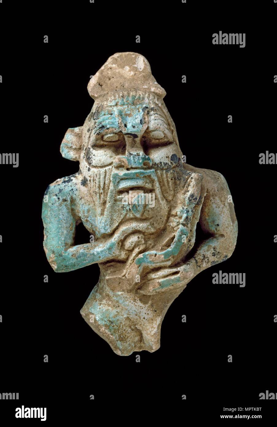 Faience amulet of Bes nursing a Horus, XXVth Dynasty (c770 BC-c715 BC). Artist: Unknown. Stock Photo