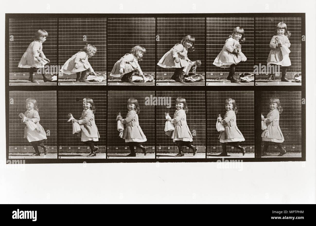 Child playing with doll, Plate 481 from Animal Locomotion, 1887 (photograph) Stock Photo