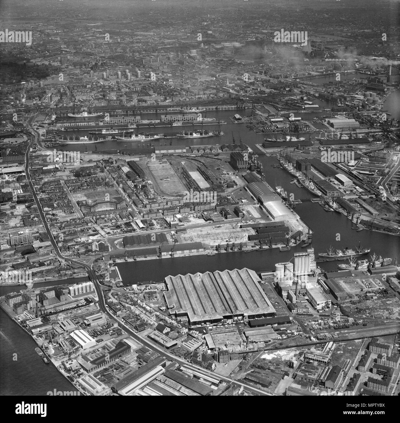 West India and Millwall Docks, Tower Hamlets, London, 1963. Artist: Aerofilms. Stock Photo