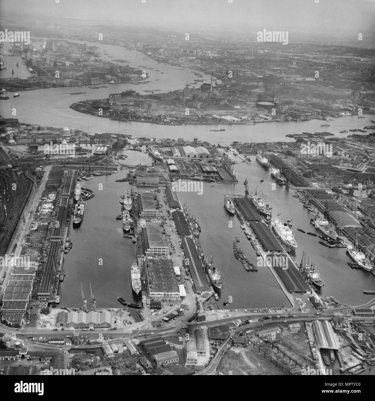 West India Docks, Tower Hamlets, London, 1964. Artist: Aerofilms. Stock Photo