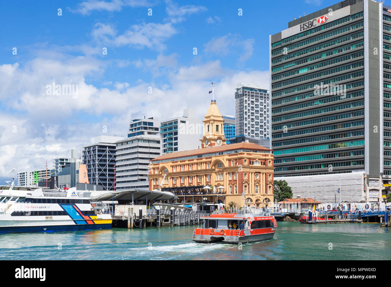 new zealand auckland new zealand north island the Ferry building Quay street Auckland waterfront with arriving ferry new zealand north island Stock Photo