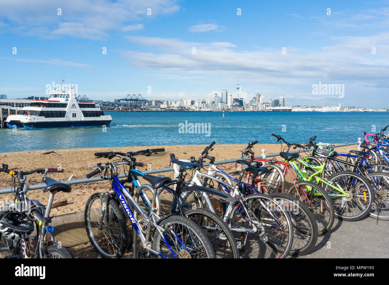 new zealand auckland new zealand north island commuters bikes left by devonport ferry terminal to auckland harbour waterfront stanley bay auckland nz Stock Photo