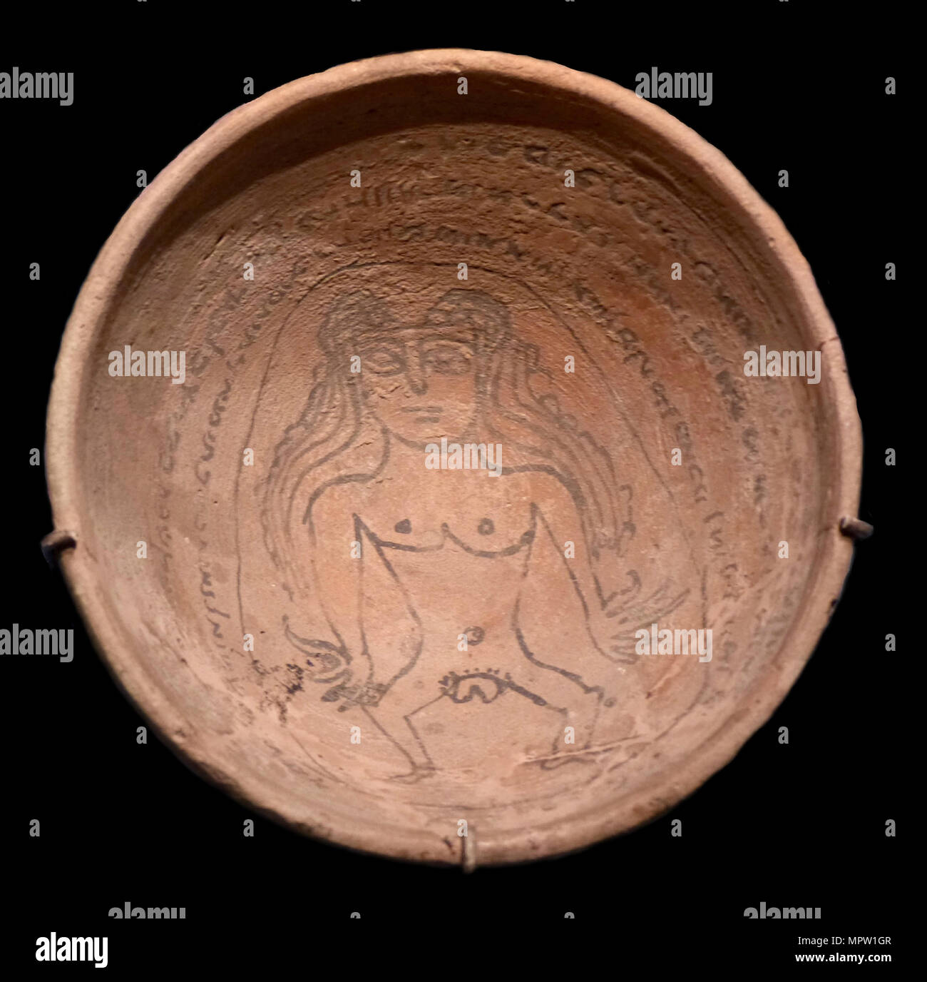 Magic bowl with an incantation text in Judeo-Aramaic and an image of the demon Lilith, 5th-6th centu Stock Photo
