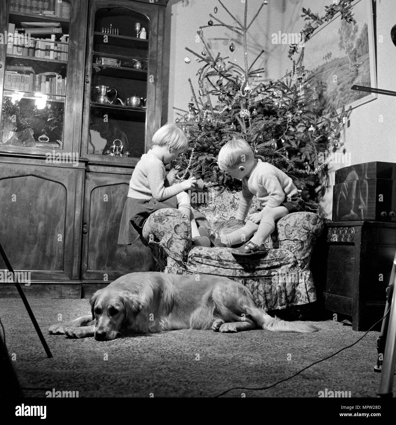 Christmas time, 1960. Artist: John Gay. Stock Photo