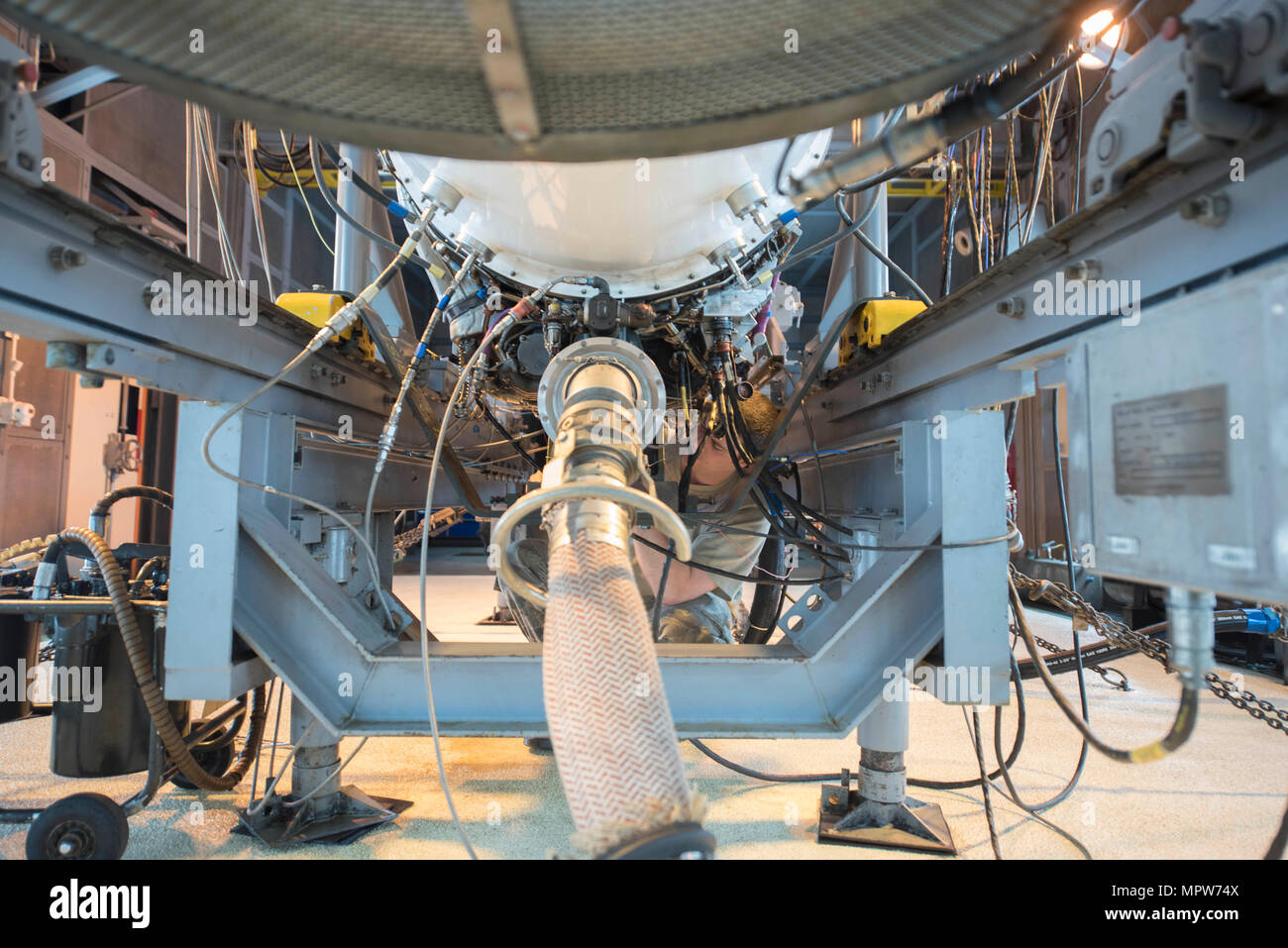 U.S. Air Force Staff Sgt. Donovan Walters, 18th Component Maintenance  Squadron aerospace propulsion craftsman, checks a valve on a F100/220 engine  March 10, 2017, at Kadena Air Base, Japan. Certain parts of