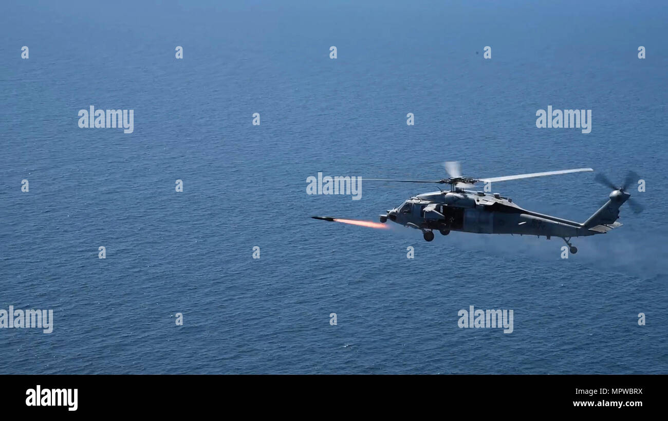 OCEAN (April 10, 2017) An MH-60S Sea Hawk helicopter assigned to the ...