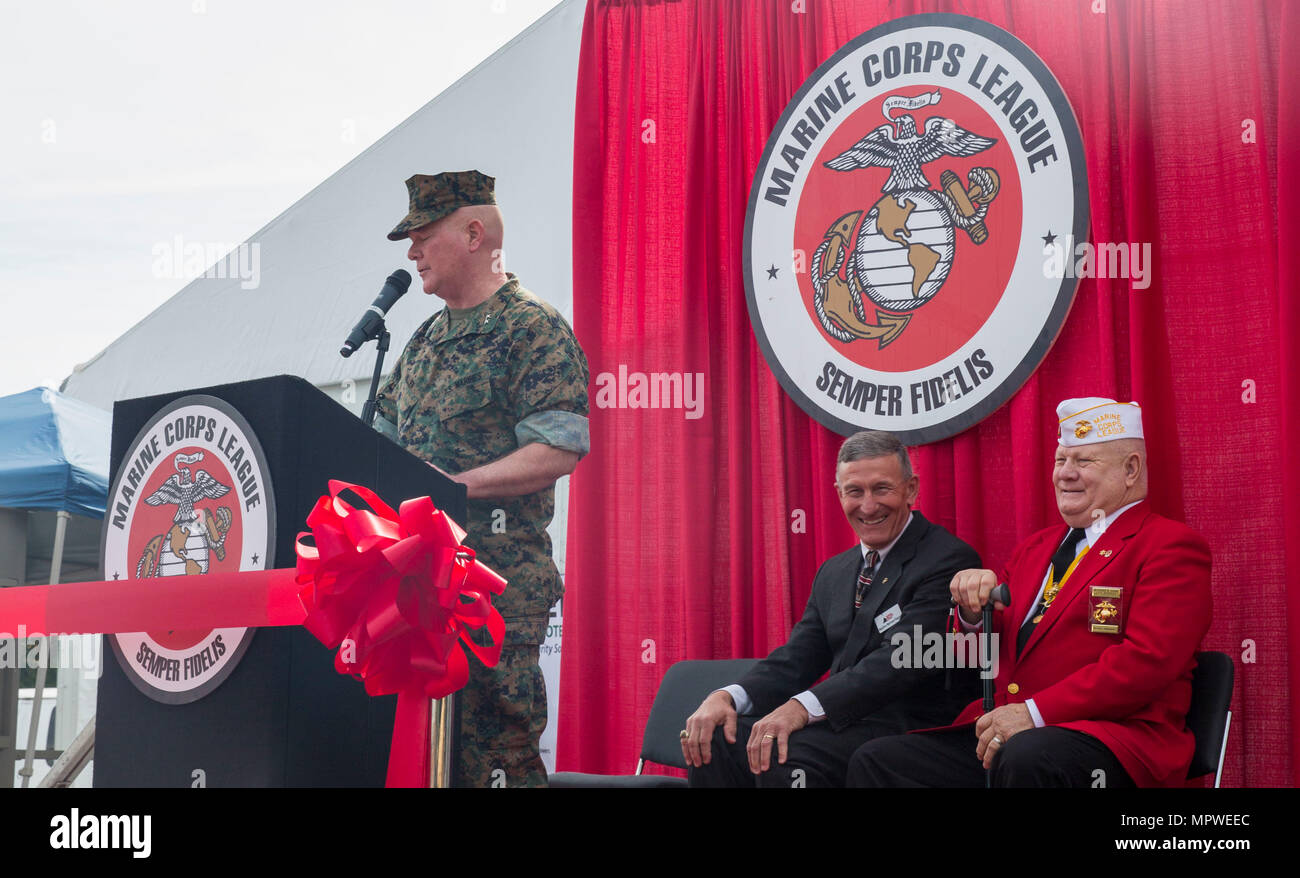 U.S. Marine Corps Maj. Gen. Walter L. Miller Jr., commanding general, II Marine Expeditionary Force, speaks to guests at the opening ceremony for the Marine South Military Exposition, Goettege Field House, Camp Lejeune N.C., April 13, 2017. The Marine South Exposition is sponsored by the Marine Corps League and is a forum for defense contractors to display, inform, and promote the latest in defense equipment and technology. (U.S. Marine Corps photo by Lance Cpl. Ashley D. Gomez) Stock Photo