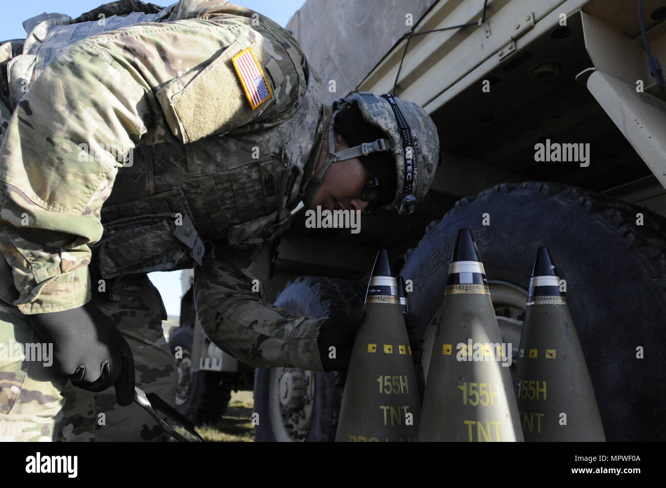 Pvt. Michael Silvas 2nd Battalion 17th Field Artillery Battery adjusts
