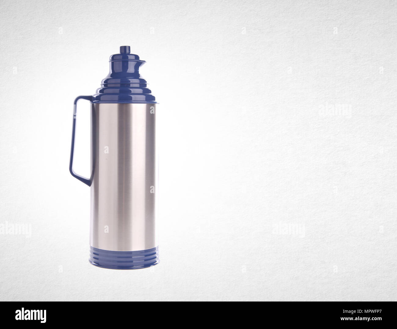 Thermo or Thermo flask from stainless stee on background Stock Photo