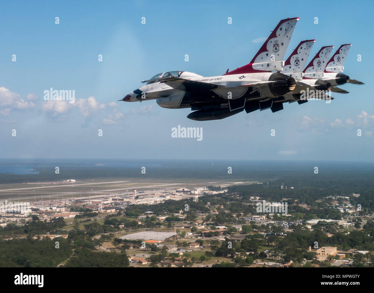 The Thunderbirds perform over Tyndall Air Force Base, Fla., during a ...