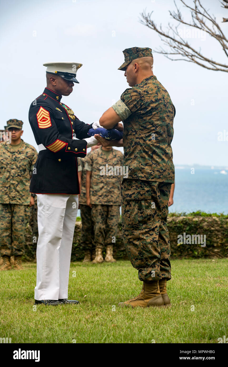 U.S. Marines and families with the 3D Marine Division attend a ...