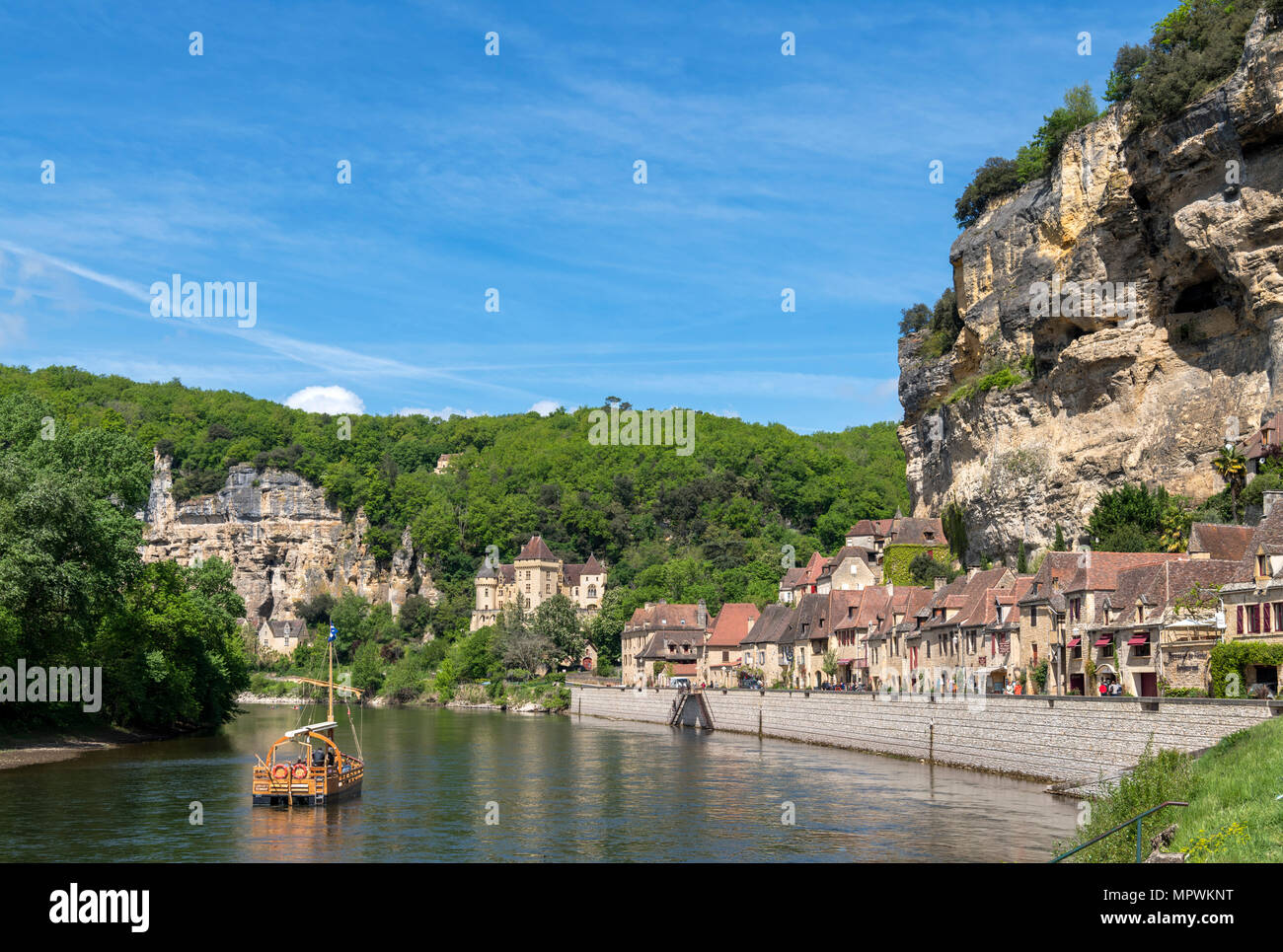 Excursion boat on the River Dordogne in La Roque Gageac, Dordogne, France Stock Photo